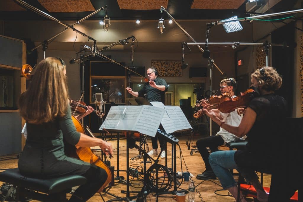 A record session for Synthesis: The String Quartet Project, with Ryan Truesdell Conducting, photo by Leo Mascaro