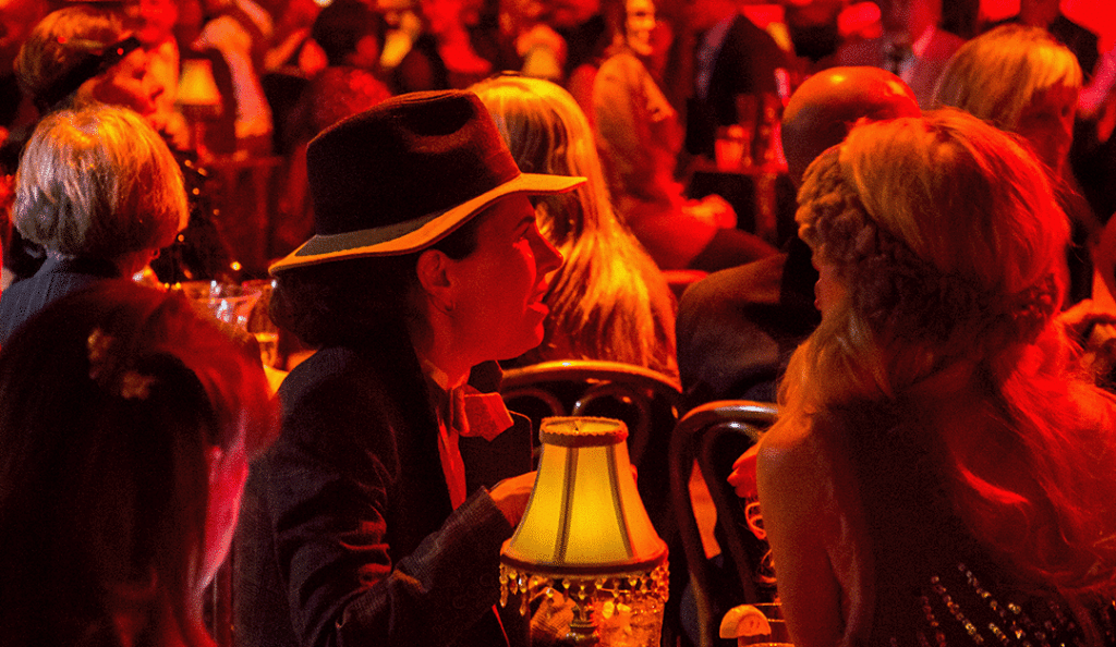 Audience members at The Wild Party, an immersive Jazz Age-musical presented by the Denver Center Theater Company