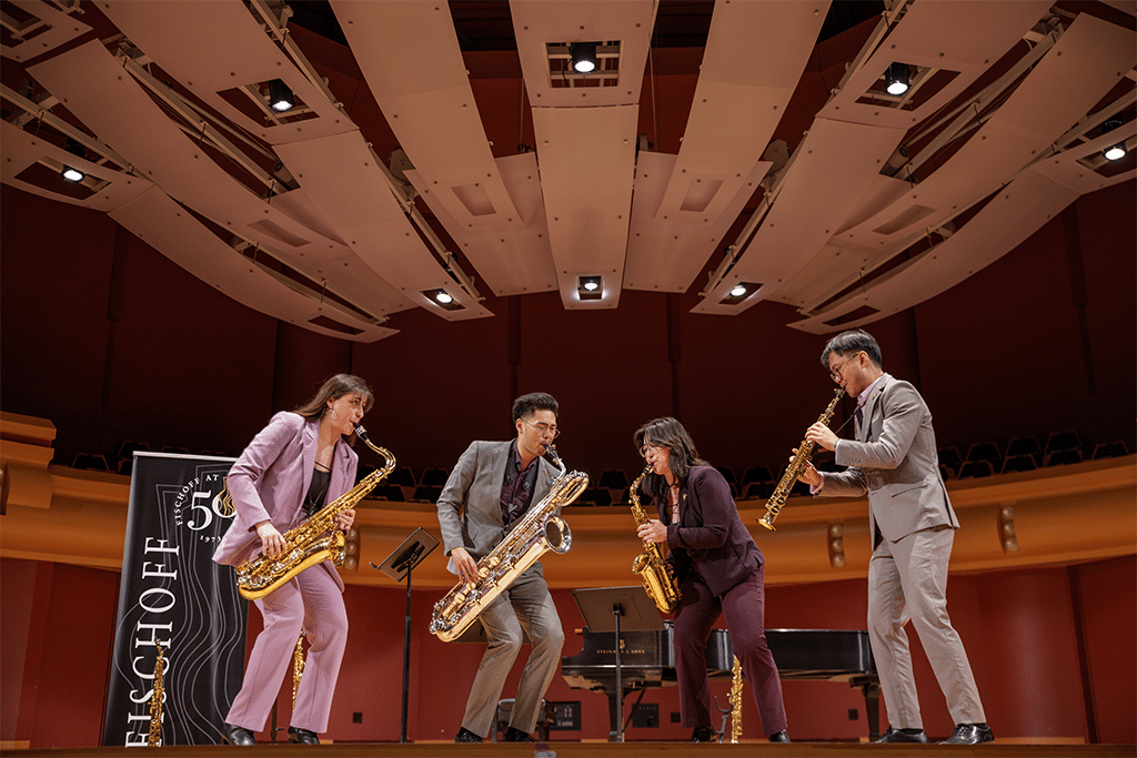 Sax quartet playing in concert venue